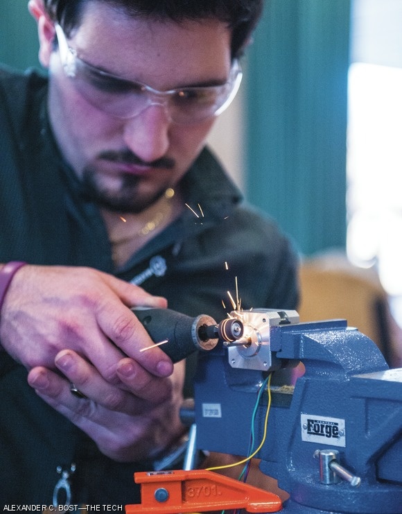 Jack Erdozain ‘17 uses a dremel to modify an electric motor mount.