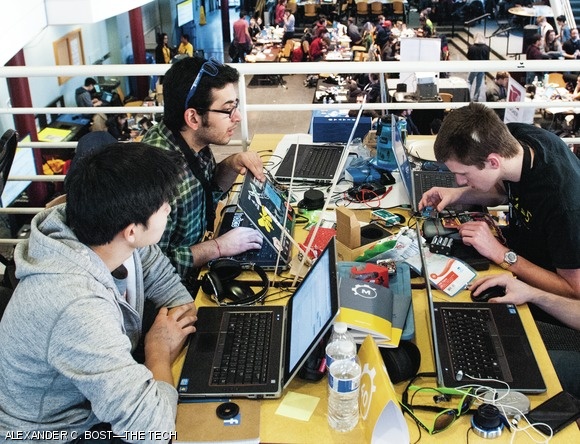 A team works on their project during the hackathon.