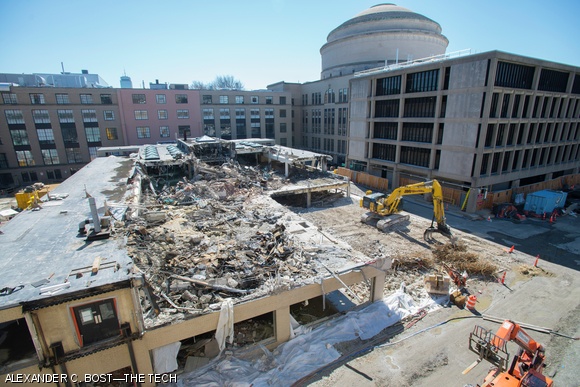 Building 12 as seen from Building 24 on Sunday, March 29. The building, about one quarter of the way through demolition, will make way for the new MIT.nano facility, which is expected to be complete by 2018.