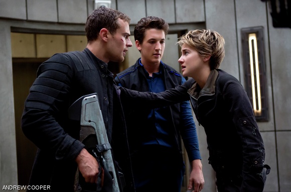 Four (Theo James, left), Peter (Miles Teller, center), and Tris (Shailene Woodley, right) star in The Divergent Series: Insurgent.