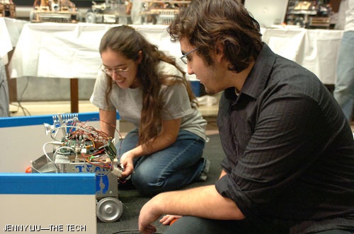 Eletha J. Flores ‘10 and Ayman S. Abu Shirbi ’09 calibrate their robot.