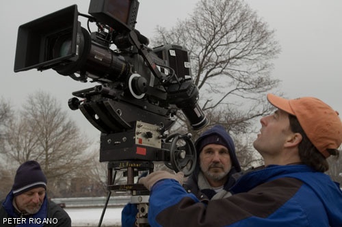 (left to right) Dolly Grip Tony Campenni, Camera Operator David E. Diano, and First Assistant Camera Erik L. Brown shoot footage of the MIT campus for the upcoming film based on the story of MIT students who made money in Vegas by counting cards.