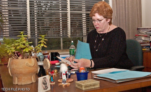 Former Dean of Admissions Marilee Jones peruses Class of 2007 applications in this file photo. Jones’s resignation was publicly announced on Thursday, after it was discovered that she had misrepresented her educational information on her résumé.