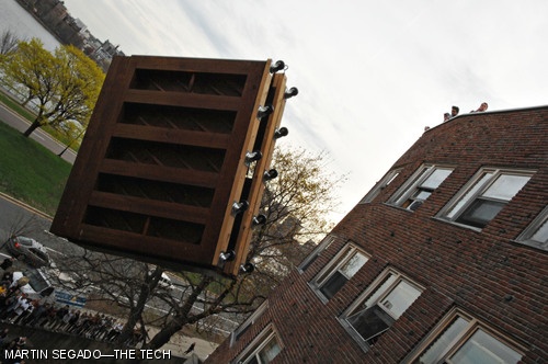 A piano is captured in the last fleeting moments before it crashes to the ground.