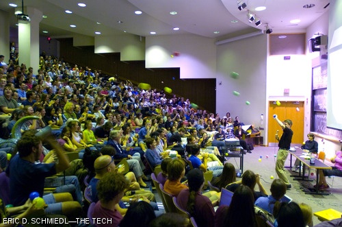 xkcd artist Randall Munroe is bombarded by playpen balls after they dropped from the ceiling of 10-250 during the LSC-sponsored xkcd lecture.