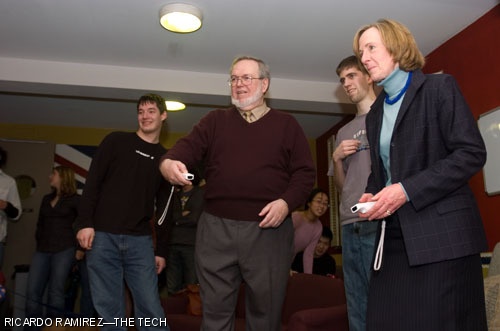 Evan C. Iwerks ’10 (center) teaches Burton-Conner Housemaster Merritt R. Smith and President Susan Hockfield how to play tennis with the Nintendo Wii. Hockfield toured Burton-Conner as part of her continuing effort to learn more about the MIT community.