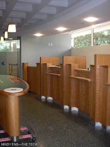 Final touch-ups are made to the new MIT Federal Credit Union branch on the first floor of the Student Center. For more information, see the news brief on page 8.