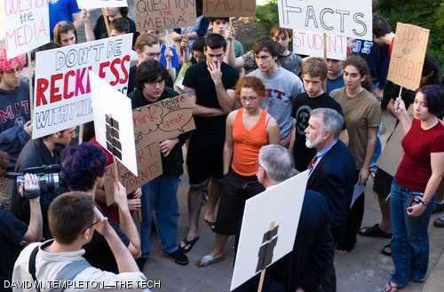 Dean for Student Life Larry G. Benedict speaks with students protesting outside of Walker Memorial on Monday. The students were protesting the reaction of the MIT administration to the arrest of Star A. Simpson ’10 on Friday.