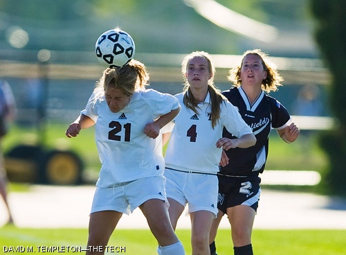 Claire M. DeRosa ’11 heads the ball while teammate Andrea E. Bradshaw ’09 and Westfield State’s Jenn Leveille look on during the women’s soccer game at Steinbrenner Stadium Tuesday afternoon. The Engineers lost 0-3, breaking the Beavers’ six-match winning streak.