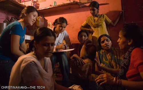 Jessica K. Lee ’08 (left) works with a Hindi-speaking student from the Rai Foundation, interviewing the women about their health, their children’s health, and education issues. The surveys collected were later used to create a unique project to benefit one of the slum communities in India.
