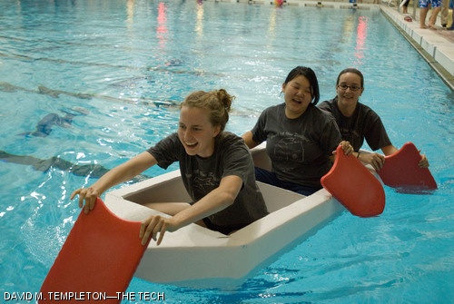 Cardboard regatta, Head of the Zesiger, winners Rebecca K. Oman ’08, Chensi Ouyang ’08, and Ellann Cohen ’08 cross the finish line after their first run on Friday, Oct. 19. Their boat, Ship Happens, was the only vessel to survive at the end of the day.