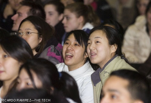Ellen T. Wong ’09 (left) and Lihua Bai ’09 (right) marvel at the unique features of the 2009 Ring design.