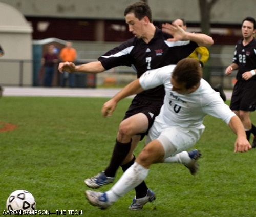 Joshua J. Campoverde ’08 slides to keep the ball from Worchester Polytechnic Institute’s Evan Demers-Peel during the final minutes of the Saturday’s match. The Engineers defeated WPI 1-0.
