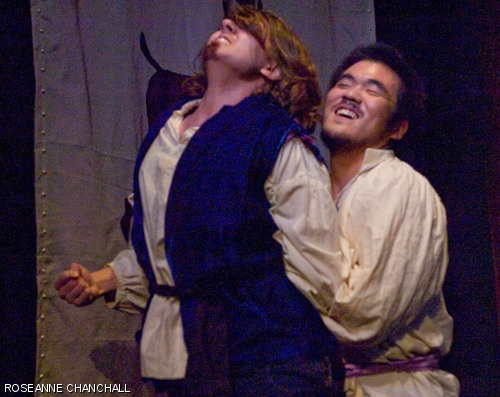 Queen Tamora’s sons, Chiron (Sabrina M. Neuman ’09, left) and Demetrius (Akira Kobayashi ’10, right), fight over who will rape Titus’ daughter Lavinia. The MIT Shakespeare Ensemble is performing Titus Andronicus on Nov. 1–3 in Kresge Little Theater.