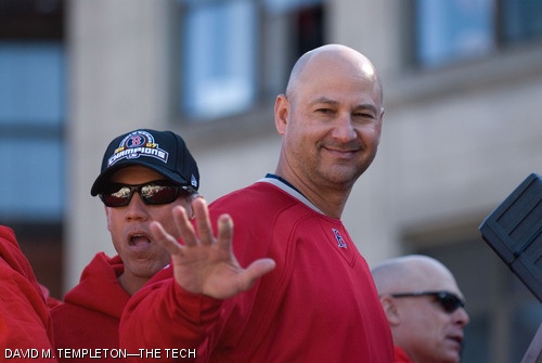 Red Sox Manager Terry Francona waves to the crowd during Wednesday’s Rolling Rally in Boston. The rally began at Fenway Park and made its way to City Hall Plaza in Duck Boats, stopping occasionally to let star closer Jonathan Papelbon perform his now famous Irish dance. See page 15 for more photos.