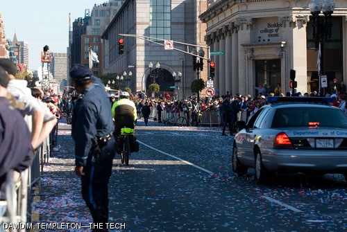 Thousands of fans line Boylston St. eagerly trying to see the 2007 World Champion Red Sox as they pass during Wednesday’s Rolling Rally. The rally began at Fenway Park and made its way to City Hall Plaza in Duck Boats, stopping occasionally to let star closer Jonathan Papelbon perform his now famous Irish dance.