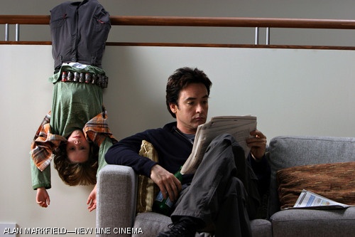 Bobby Coleman (left) stars as Dennis and John Cusack (right) stars as David in “Martian Child.”