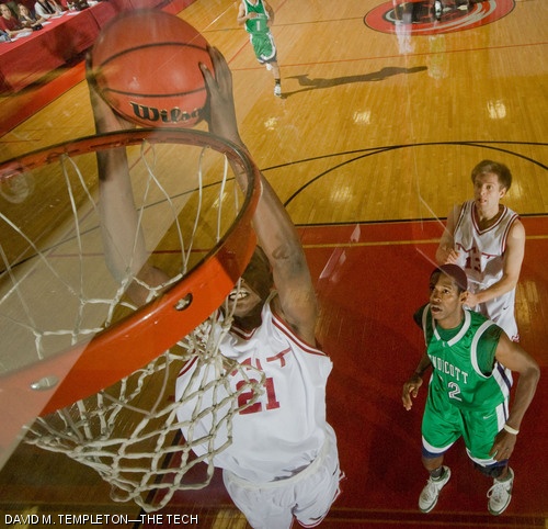 Hamidou Soumare ’08 dunks during the first period of the men’s basketball Nov. 29 victory over Endicott College. Soumare set a career high with 22 points, 16 rebounds, and five steals.