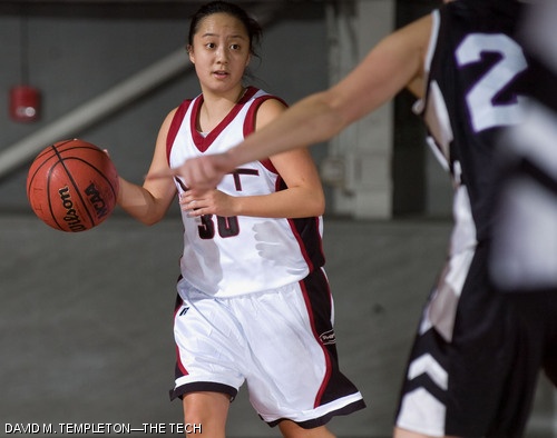 Kimberly E. Soo Hoo ’08 drives the offence during the first period of the women’s basketball’s Nov. 29 game against Emerson College. Soo Hoo had nine assists in the 54-43 loss.