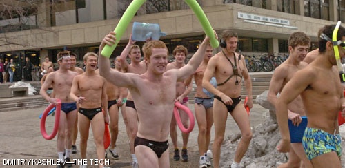MIT men's varsity swim team displays their high adrenaline levels outside the Student Center during their annual Speedo Run down the Infinite Corridor. They will face their toughest rivals at the New England Women's and Men's Athletic Conference championship at Wheaton College this weekend.