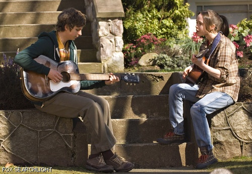 Juno (played by Ellen Page) and Bleeker (Michael Cera) play the guitar together after surviving the many hardships of teenage pregnancy in the movie “Juno.”