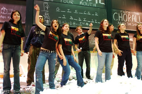 Jared C. Sadoian ’10, as a member of the “Boston Bomb Squad,” rushes fellow Chorallaries off-stage at the mention of the word “bomb” after a sketch about affirmative action’s prevalence at MIT.