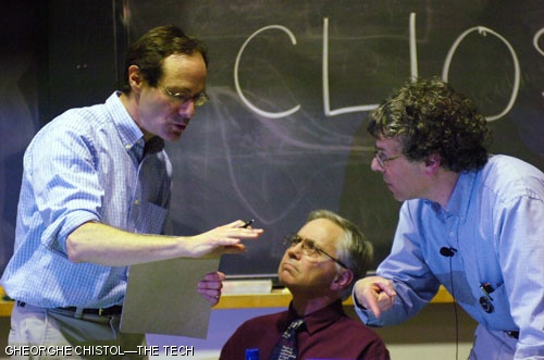 Mathematics Professor David S. Jerison, Michael Ouellette, senior lecturer in the Music and Theater Arts Department, and Jeremy M. Wolfe, senior lecturer in the Brain and Cognitive Sciences Department, of the Hamentashen team prepare a counterargument to the Latke team during the Latke vs. Hamentashen Debate. The debate attracted a large audience that filled 10-250 on Monday night. Following the debate, participants and viewers enjoyed hundreds of hamentashen and latkes in Lobby 10.