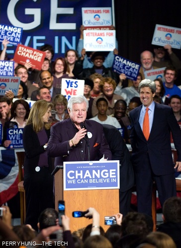 Massachusetts senators Edward M. Kennedy and John F. Kerry speak on stage just before Senator Obama.