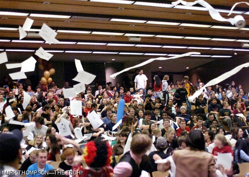 Paper — both printer and toilet — flies through the air at the start of the concert at 11:59:59 p.m. on Saturday.