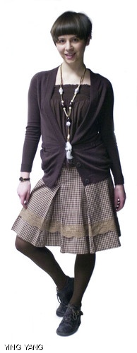 Agata Wisniowska ’11 is wearing a cardigan from Victoria’s Secret ($25) while everything else: necklace ($10), tank top ($5), skirt ($30), tights ($5), and shoes ($30) was bought in Poland. Why we like her look: Wisniowska’s outfit is well coordinated and perfect for spring, brightening up any cloudy/rainy day.