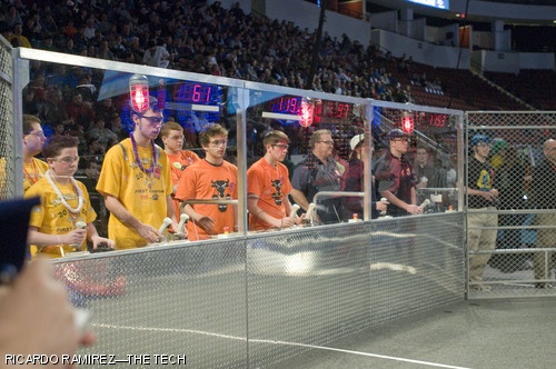 Teams (left to right) 61 “The Shifters”, 97 “The Cow” (Sponsored by MIT), and 1153 “The RoboRebels” compete in the semifinals of the For Inspiration and Recognition of Science and Technology (FIRST) robotics competition. High school students from all over New England descended on Boston University’s Agganis Arena last Saturday, March 29 for the regional championship.