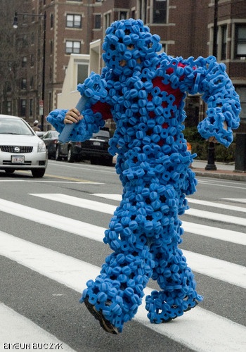 Aaron E. Ramirez ’10, the “Foameez Monster,” walks across the 77 Massachusetts Ave. crosswalk on Saturday after the MIT Hobby Shop open house. Foameez are a commercial toy first invented at the Hobby Shop by Kenneth Stone ’72 and Professor Alexander H. Slocum.