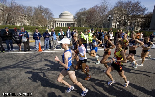 Deena Kastor (in the white hat) runs past Killian Court shortly before the twelve-mile mark in the 2008 Women’s Marathon Olympic Trials on Sunday as the chase pack attempts to catch leader Magdalena Lewy Boulet. Kastor overtook Lewy Boulet to win in 2:29:35.