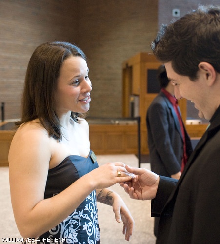 2010 Ring Committee President Laura E. Aust ’10 shows off her Brass Rat during the ring delivery at Moakley Courthouse on the Boston waterfront on April 26.