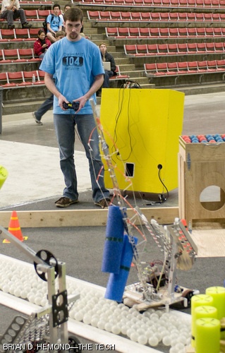 Jacob G. Latcham ’09 concentrates on steering his robot, intending to dump the “trees” he harvested from the “forest” into the “river.” The annual 2.007 competition, this year entitled “Da(yes)MIT” or “Save the Baby Beavers,” was held last Wednesday and Thursday, May 7 and 8, in the Johnson Athletic Center.