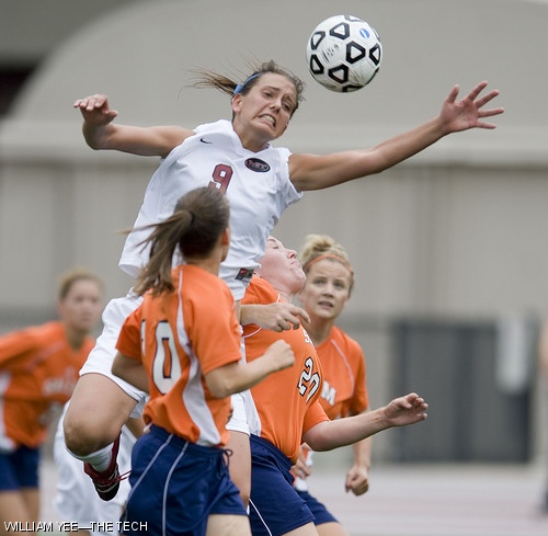 Kathryn A. Pesce ’10 leaps up for the ball in between two Salem State players during a corner kick on Saturday, Sept. 13. The Engineers lost 0-1 due to an own goal in the 64th minute.