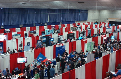 Students crowd around company booths at the MIT Career Fair, which was held in Johnson Athletic Center yesterday.