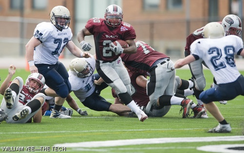DeRon M. Brown ’10 rushes out from the defensive line in the Engineer’s game against Massachusetts Maritime on Saturday, Sept. 13 at the Henry Steinbrenner Stadium. MIT overpowered Mass. Maritime 42-14 and led to their first 2-0 season start since 2004. Brown rushed for a career-best 251 yards and two touchdowns during the game.