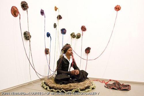 South African artist Nicholas Hlobo uses rubber, ribbon, lace, and tassels in his exhibition for the ICA’s momentum series. The piece pictured above is part of his live performance gallery called “Thoba, utsale umnxeba” which translates into “to lower oneself and make a call.”