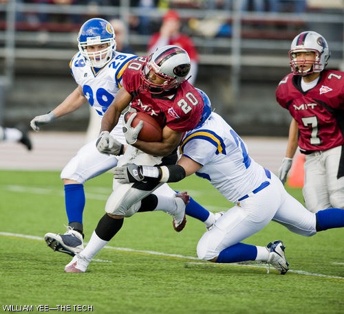 DeRon M. Brown ’10 attempts to avoid a tackle in the football game against Western New England College. Brown rushes 207 yards for four touch downs in 25 carries, leading to an 48-15 victory for MIT.