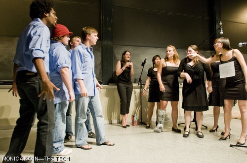 Members of the Muses and St. Louis University’s Bare Naked Statues face off in a beatboxing battle during the Muses’ fall concert on Friday night.
