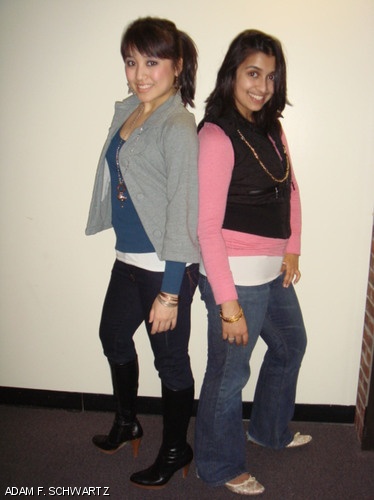 Ying Yang ’10 and Manisha Padi ’10 (the column writers) in their layered outfits. Yang is wearing skinny jeans from Express ($60), jacket from PacSun ($30), and sweater from H&M ($15). Padi is wearing jeans from Express ($40), vest from Dots ($10), and shirt from Aerie ($7). They are both wearing accessories from Aldo Accessories and shoes from Payless. Why we chose these: Layering up like this in the cold Boston weather allows us to be comfortable and look cute at the same time.