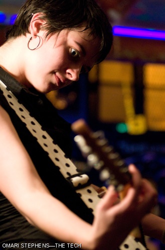 Carrie A. McDonough ’08 plays lead guitar between verses during the performance by the carrie okie band (aka Fortran). The Bexxxley Roxxx Some More concert, which happened Saturday night in the basement of Bexley Hall, featured a number of MIT student bands.