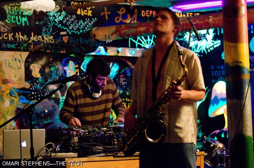 DJ Shiftee (Sam Zornow of Harvard University, left) plays a beat as Collin E. Johnson G takes a break from playing the saxophone. The Bexxxley Roxxx Some More concert, which happened Saturday night in the basement of Bexley Hall, featured a number of MIT student bands.