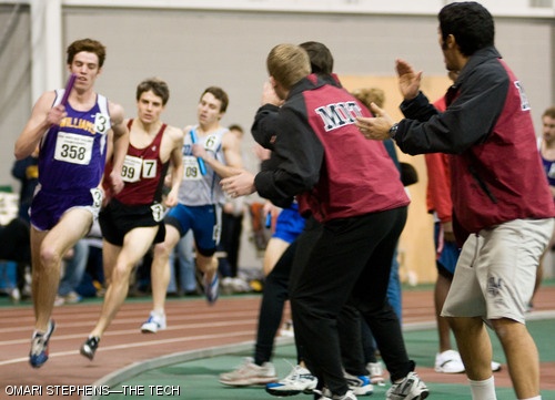 William S. Phipps ’09 tails the Williams College anchor leg as they run past cheering MIT athletes toward the final lap of the 4x800-meter relay, the final event of the men’s New England Division III championships. A finish ahead of Williams in the relay could have pushed the Engineers past Williams into 2nd place in the championship, but the Williams runner held his lead to the finish line. MIT placed 3rd with 101 points, behind Tufts University (118 points) and Williams College (106 points).
