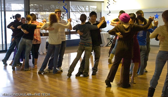Partners line up to practice their technique during ballroom dance lessons at MIT’s 16th Annual Charm School on Jan. 30. Other events on Friday included a library etiquette class and a discussion on table manners.