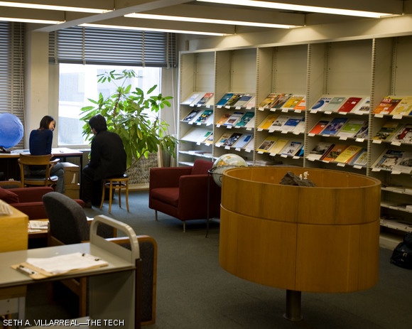 Wenjia Zhu ’11 and Bo Han ’10 use the Lindgren Library lobby for a quick phone conference on March 16. Because of budgetary constraints, Lindgren Library (Building 54) and the Aeronautics and Astronautics Library (Building 33) will likely close in the near future, as reported in last week’s Tech.