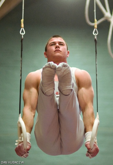 Thomas S. Caldwell ’09 does an L-seat on the rings during MIT’s match versus the College of William and Mary on March 13. The engineers lost 335.7-314.4 in their final home meet.