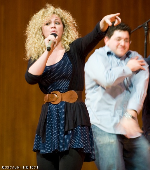 Caroline H. Hunting ’11 (left) of a cappella group Resonance performs Lauryn Hill’s “Doo Wop (That Thing)” at the Varsity Vocals International Championship of Collegiate A Cappella Northeast Semifinals held Saturday, March 21 in Kresge Auditorium. Resonance, which hosted the competition, performed six songs while the judges deliberated.