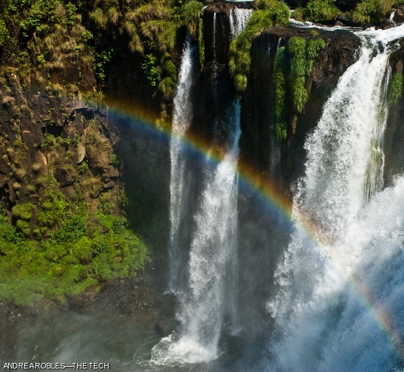 HOLA—A rainbow bursts out of a catarata (waterfall) in an Argentine national park. It is one of 275 falls that make up the Iguaçu Falls, which spread over Argentina, Brazil and Paraguay.